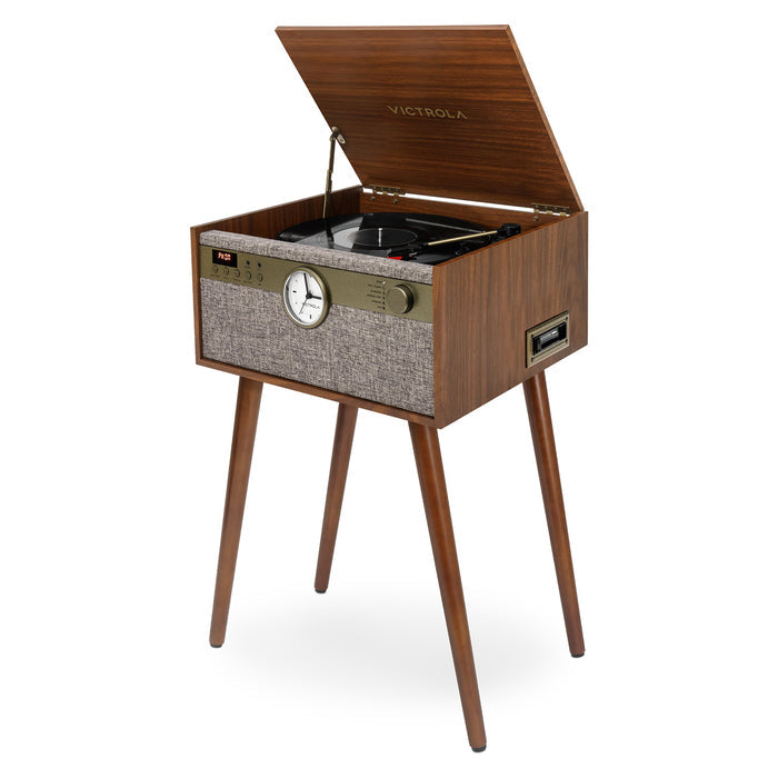 Victrola Century Signature 6 in 1 Music Center With Clock and Legs WalnutMid-Century Elegance The Victrola Century Signature+ Bluetooth, record player brings elegant mid-century design to the all-in-one music center The Century Signature+ features a 3-spe
