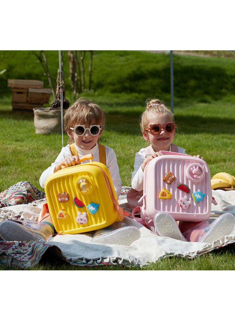 Picocici K33 Kids Travel Backpack= Two children with colorful suitcases sitting on a blanket outdoors.