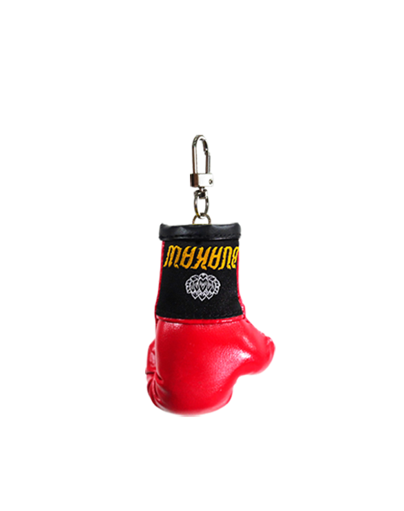 Buakaw Boxing Glove KeychainSports ClothingMade from high-quality PU leather and featuring a classic lobster hook, this stylish accessory comes adorned with the Buakaw brand label in striking gold and black colors. It makes a perfect Muay Thai souvenir fr