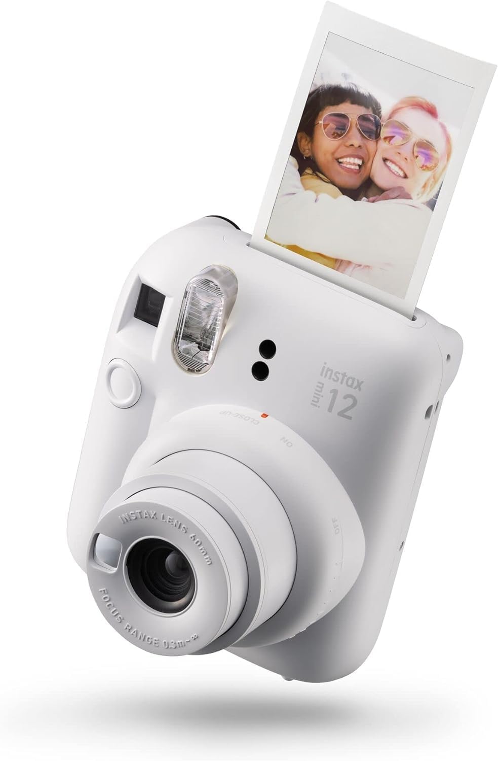 Fujifilm INSTAX mini 12 instant Film CameraCamerasFill your world with joy Automatic Exposure. Ready to goTake it easy. The mini 12 features automatic exposure and flash control, so you can simply aim and click. No messing around with settings, or remembe