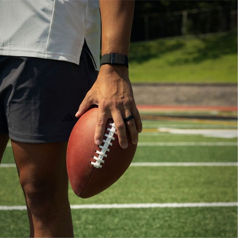 WHOOP Jet Black fitness band on wrist