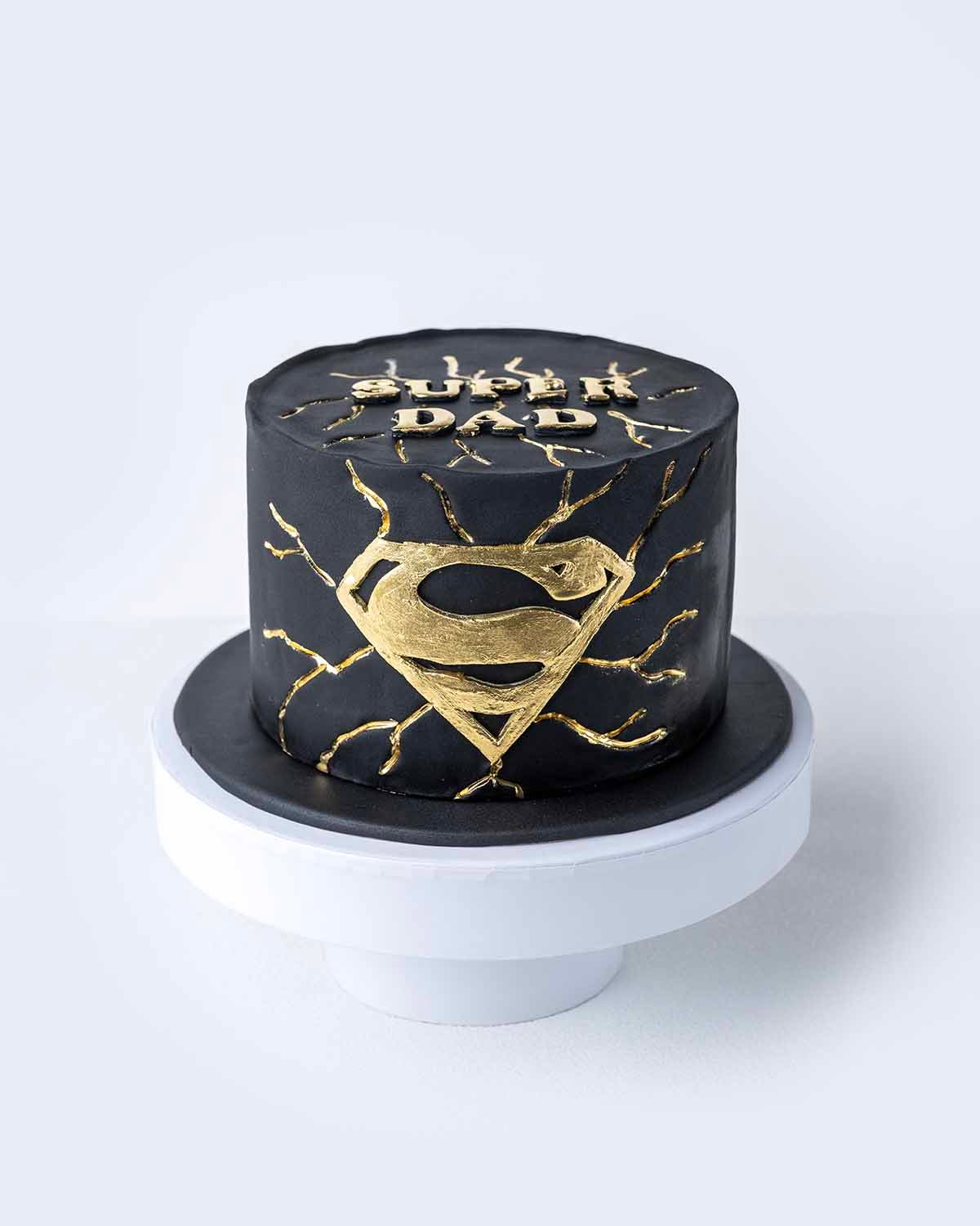 Super Dad CakeChocolate & ConfectioneryYour Gift Contains: • 1kg Super Dad Cake • Flavor: Chocolate/Vanilla/Red Velvet • Cake Dimension: 15x15x10cm • Box Size: 21x21x25 Contant us directly for Vegan, Sugar free, or Keto variant Handling and Storage • Keep