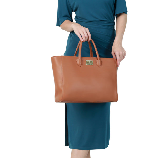 Holborn Classic Tiara Everyday Tote - BrownHandbags & WalletsThe Tiara Everyday Tote in brown is the perfect work bag for women. Made with eco-leather, it is not only stylish but also environmentally friendly. Stay organized and stylish all day long with