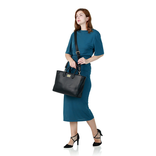 Holborn Classic Tiara Everyday Tote - BlackHandbags & WalletsThis Tiara Everyday Tote in black is the perfect work bag for women who value both style and sustainability. Made with eco leather, this tote is durable and stylish enough for everyday use. Carr
