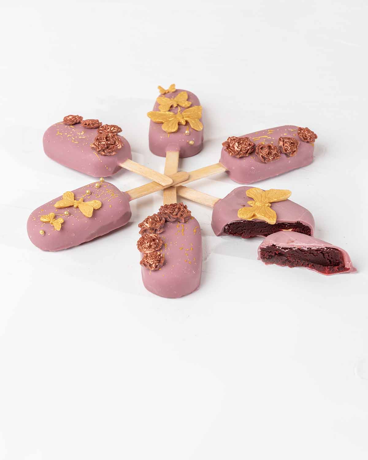 Women's Day Cakesicles by NJDChocolate & ConfectioneryYour Gift Contains:• 6 Women's Day theme Cakesicles • Flavors available: Chocolate/Vanilla/Red Velvet• Box Size: 35x15x4cmHandling and Storage • Keep away from direct heat and sunlight• Best stored bet