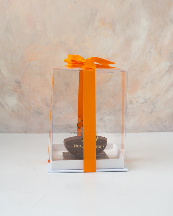 Chocolate Edible Diya by NJDChocolate & ConfectioneryYour Gift Contains: • 1 Belgian Milk Chocolate Diya Bar • Weigh of chocolate: 160grams • Size of Chocolate: 10x10x7.5cm • Box Size 16.5x16.5x20cm Handling and Storage • Keep away from direct heat and su