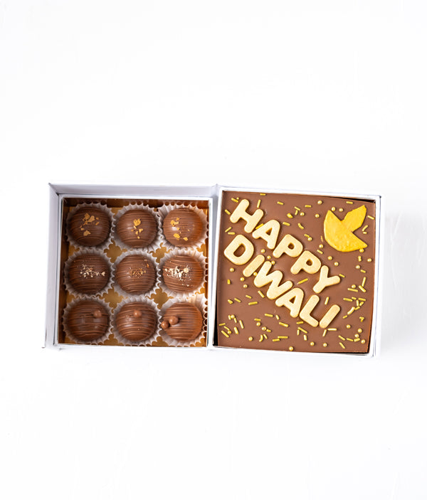 Happy Diwali Bar and TrufflesChocolate & ConfectioneryYour Gift Contains: • 1 Happy Diwali Milk chocolate bar • 9 assorted Milk chocolate Truffles • Weigh of chocolate: 270grams • Flavors: Pistachio, Hazelnut, Speculoos, Peanut Butter and Roche • Size of