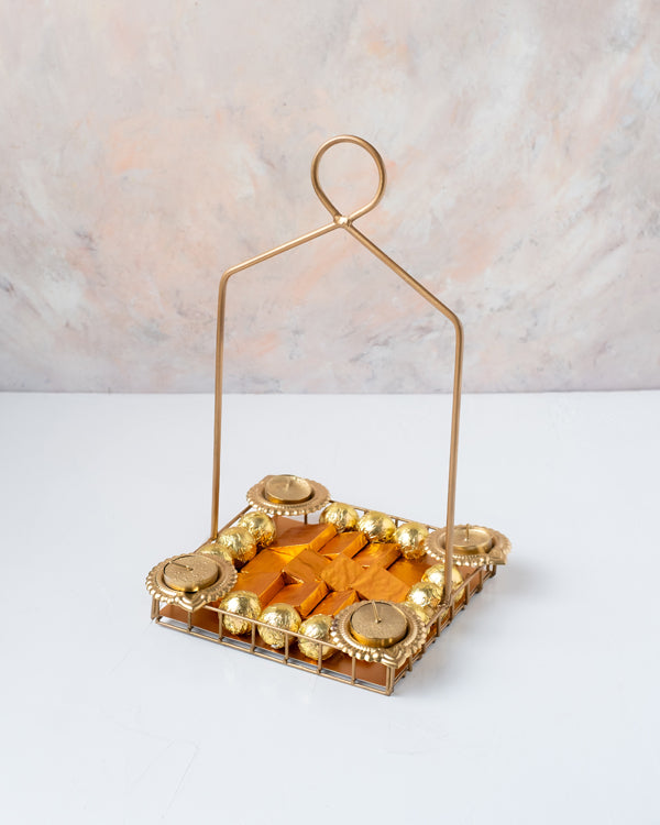 Truffles, Naps and Diya HamperChocolate & ConfectioneryYour Gift Contains: • 4 Designer Diyas • 12 assorted Milk chocolates • 12 assorted Milk chocolate truffles • Weigh of chocolate: 400grams approx. • Flavors: Pistachio, Hazelnut, Speculoos, Peanut Butt