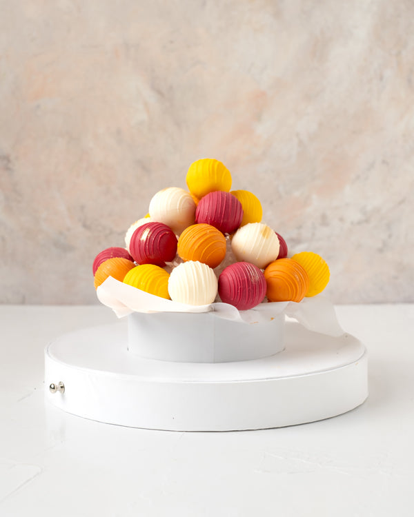 Diwali Theme Cake PopsChocolate & ConfectioneryYour Gift Contains: • 25 Chocolate Covered Diwali Cake pops • Color: Customizable • Flavors: Chocolate / Red Velvet / Vanilla • Box Size: 23x23x27cm • Color of the box may vary Handling and Storage • Keep awa