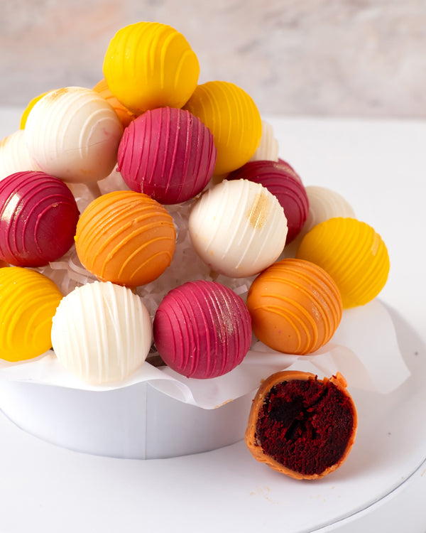 Diwali Theme Cake PopsChocolate & ConfectioneryYour Gift Contains: • 25 Chocolate Covered Diwali Cake pops • Color: Customizable • Flavors: Chocolate / Red Velvet / Vanilla • Box Size: 23x23x27cm • Color of the box may vary Handling and Storage • Keep awa