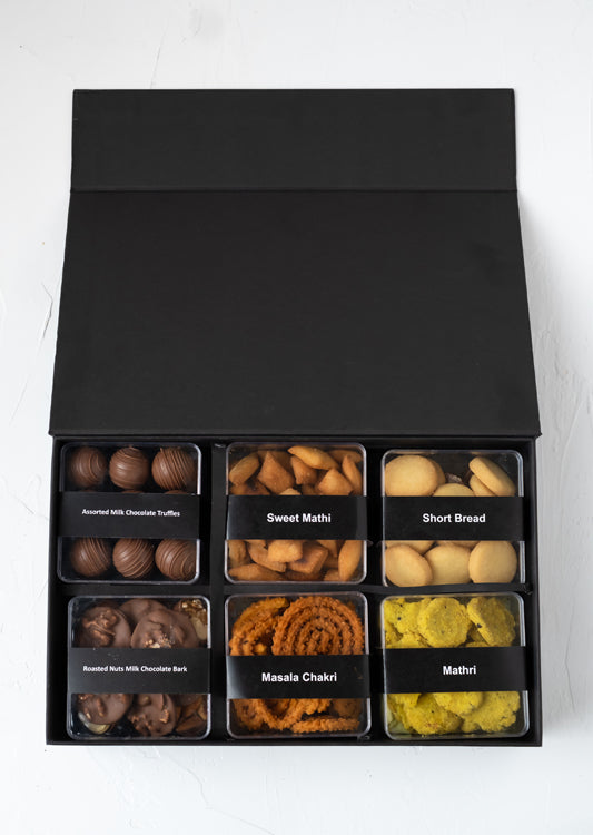 Premium Sweet and Savory Gift Box by NJDChocolate & ConfectioneryYour Gift Contains: • Approx. 200grams of Shankarpali • Approx. 200grams of Cookies • Approx. 170grams of Methi Matthi • Approx. 100grams of Murukkum Sweet • Approx. 250grams Chocolates with
