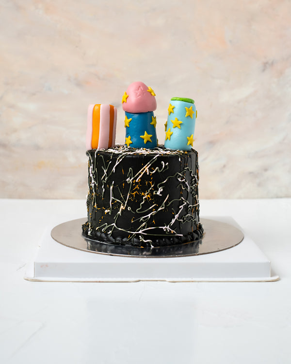 Diwali Fire Cracker theme cakeChocolate & ConfectioneryYour Gift Contains: • 500g Diwali Theme Cake • Flavor: Chocolate/Vanilla/Red Velvet • Box Size: 16.5x16.5x20cm Handling and Storage • Keep away from direct heat and sunlight • Best stored between 12-1