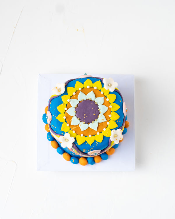 Diwali Celebration CakeChocolate & ConfectioneryYour Gift Contains: • 500g Diwali Theme Cake • Flavor: Chocolate/Vanilla/Red Velvet • Box Size: 16.5x16.5x20cm Handling and Storage • Keep away from direct heat and sunlight • Best stored between 12-18 °C •