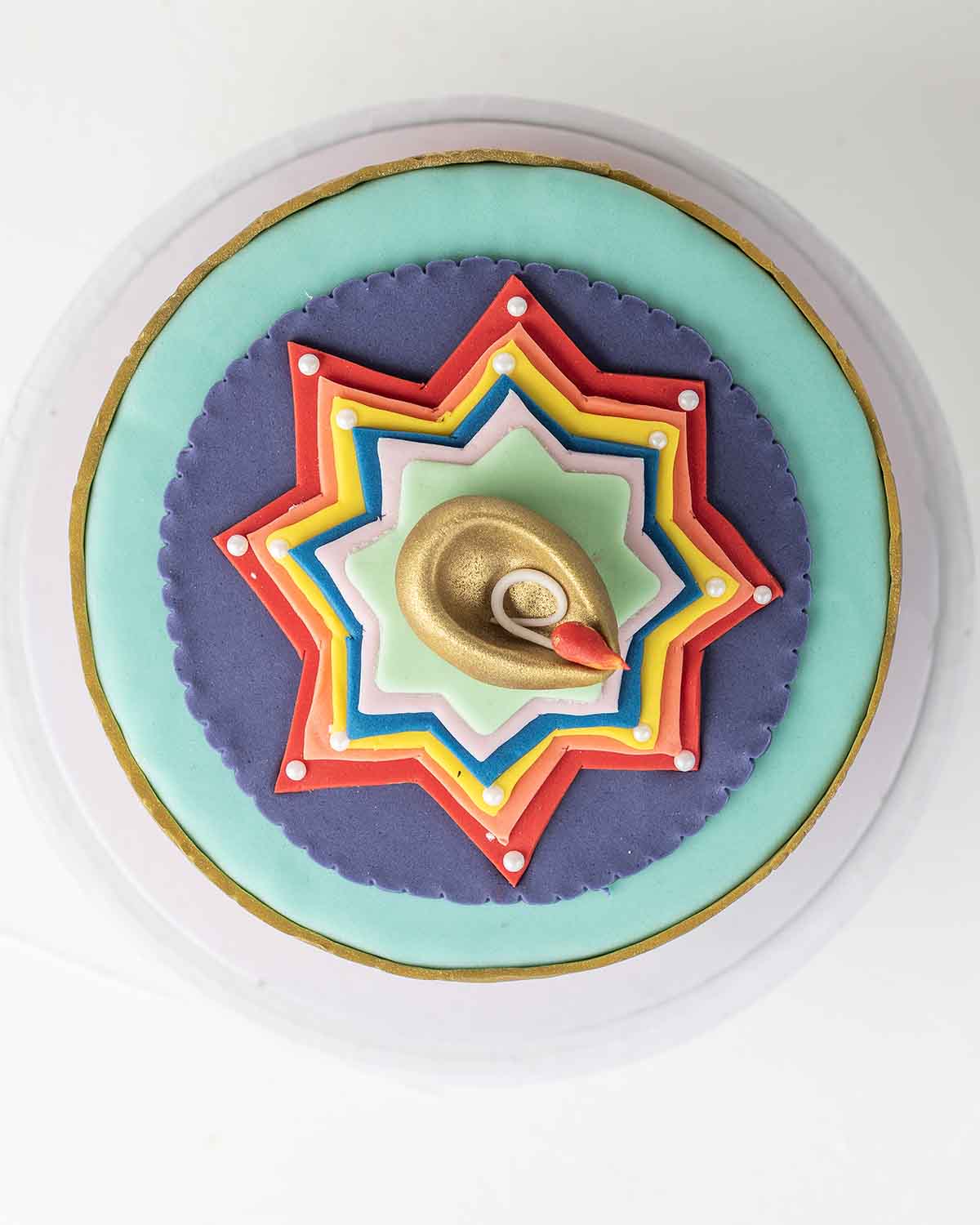 Diwali 1kg Cake with DiyaChocolate & ConfectioneryYour Gift Contains:• 1kg Diwali Theme Cake• Flavor: Chocolate/Vanilla/Red Velvet/Brownie• Box Size: 21x21x25Handling and Storage • Keep away from direct heat and sunlight• Best stored between 12-18 °C• Sui