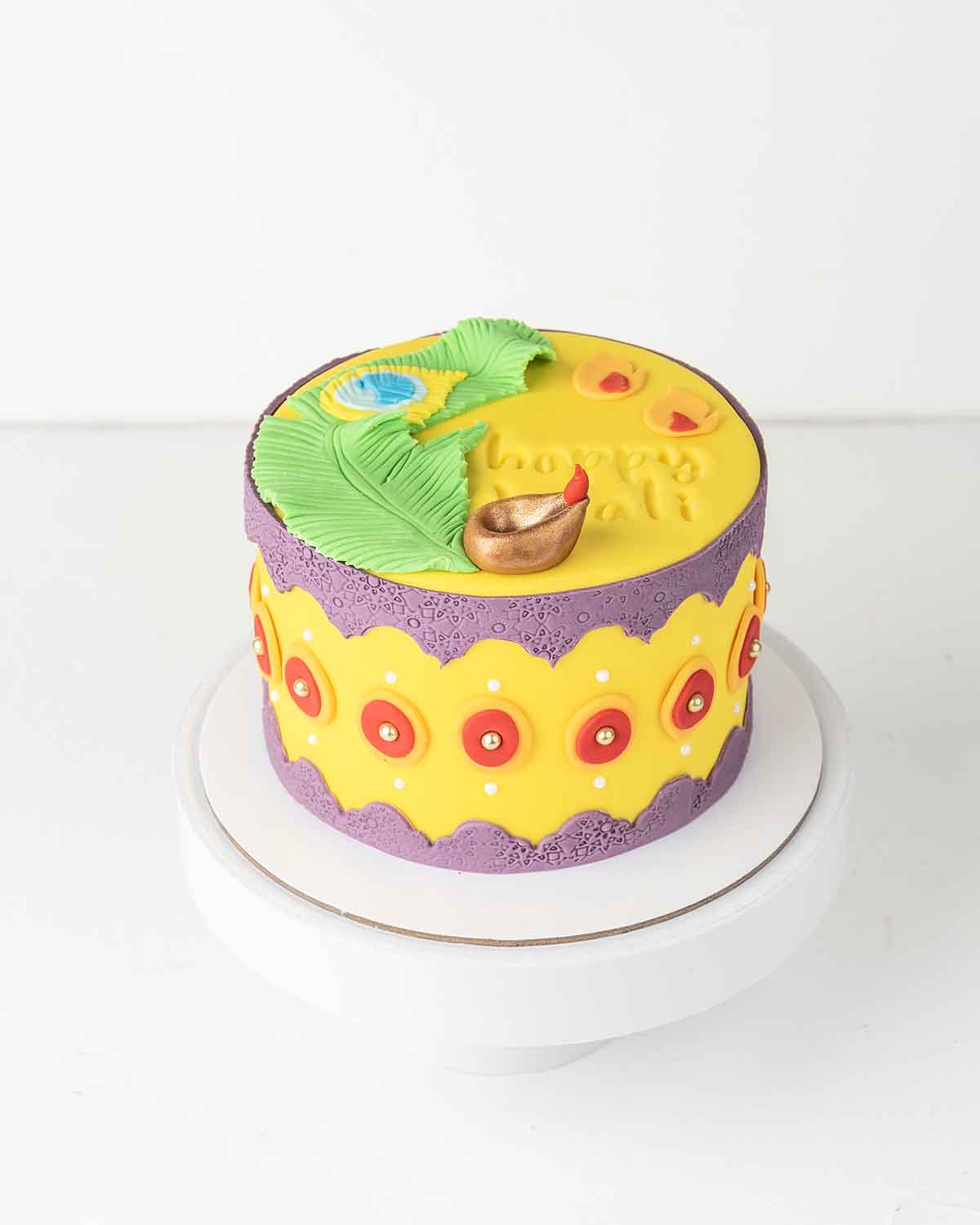 Diwali Ethnic CakeChocolate & ConfectioneryYour Gift Contains:• 1kg Diwali Theme Cake• Flavor: Chocolate/ Vanilla/ Red Velvet/ Brownie• Box Size: 21x21x25cmHandling and Storage • Keep away from direct heat and sunlight• Best stored between 12-18 °C• Suita