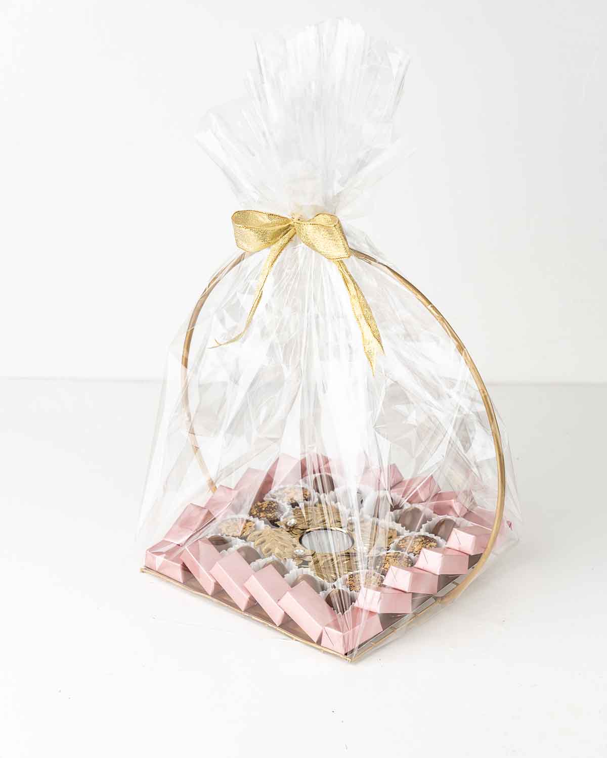 Chocolate Tray by NJDChocolate & ConfectioneryYour Gift Contains:• 1 Diya• 6 Milk Chocolate Topped with Biscoff• 10 milk chocolate truffles• 20 Assorted Milk chocolates• Flavors: Pistachio, Hazelnut, Speculoos, Peanut Butter and Roche (more flavors availa