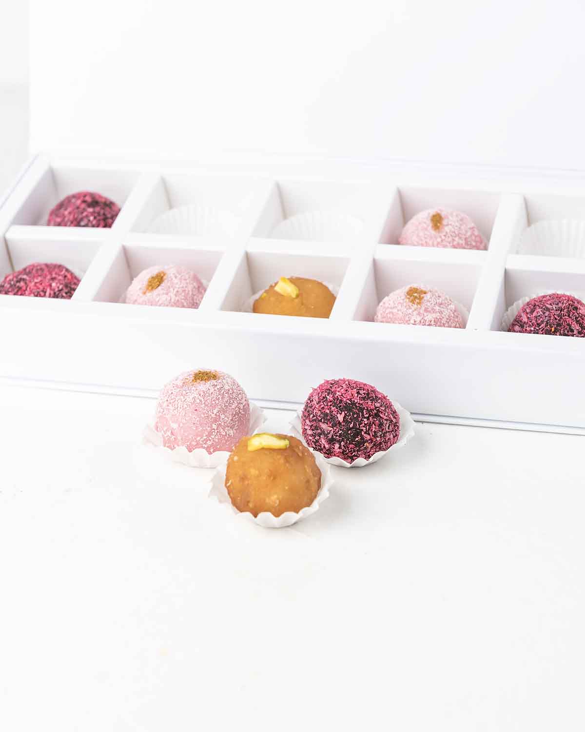 French Truffles and Gulab JamunChocolate & ConfectioneryYour Gift Contains:• 2 x Gulab Jamun • 8 x Assorted French Truffles• Box Size: 28.5x12x4cmHandling and Storage • Keep away from direct heat and sunlight• Best stored between 12-18 °C• Suitable for ve