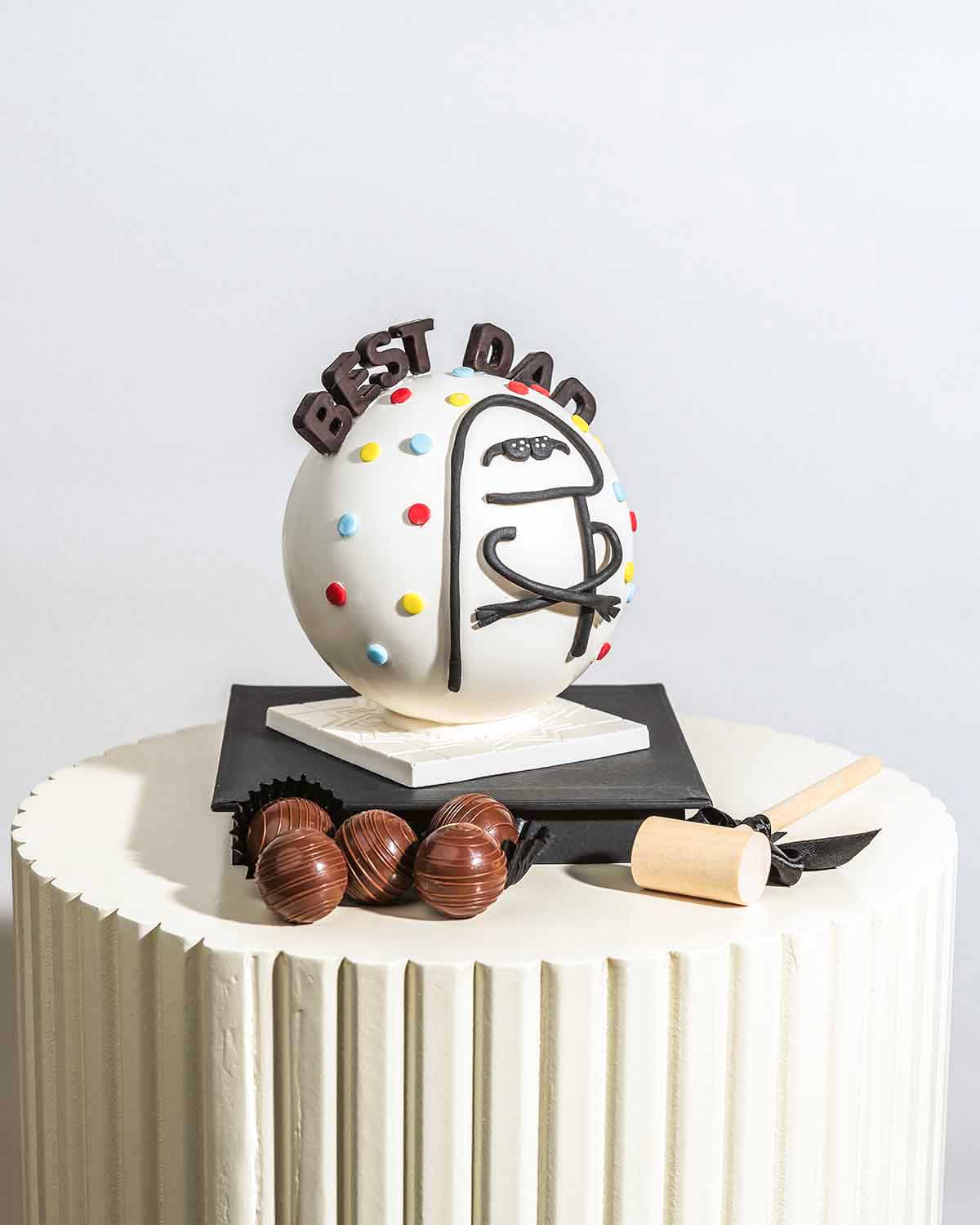 Best Dad Smashable ChocolateChocolate & ConfectioneryYour Gift Contains:• Fathers Day theme smash ball • 10 x Milk Chocolate Assorted Truffles • Flavors: Pistachio, Hazelnut, Speculoos, Peanut Butter and Roche (more flavor choices available) • Chocolate s