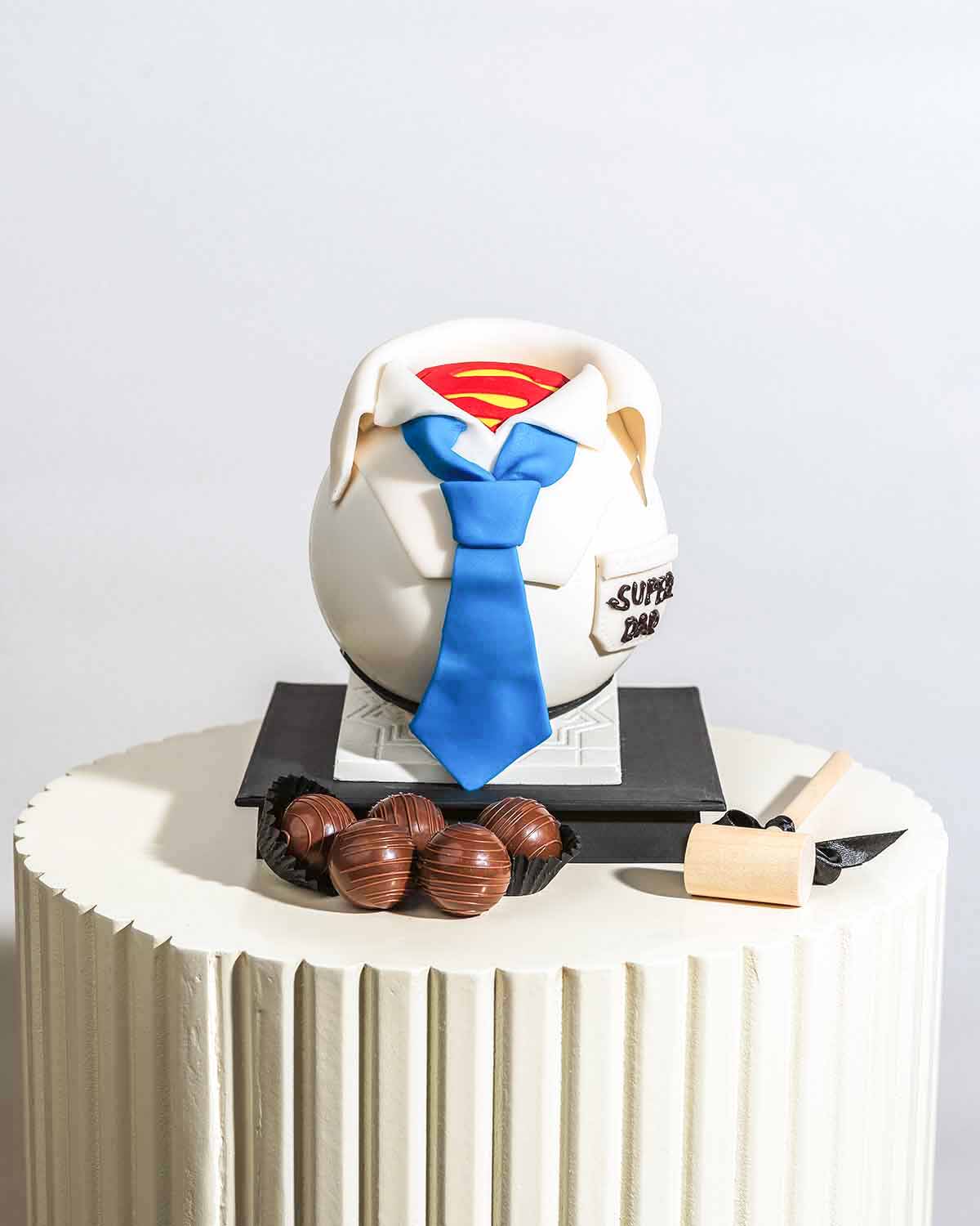 My Super Dad Smashable ChocolateChocolate & ConfectioneryYour Gift Contains:• Fathers Day theme, Super Hero smash ball • 10 Milk Chocolate Assorted Truffles • Flavors: Pistachio, Hazelnut, Speculoos, Peanut Butter and Roche (more flavor choices available)