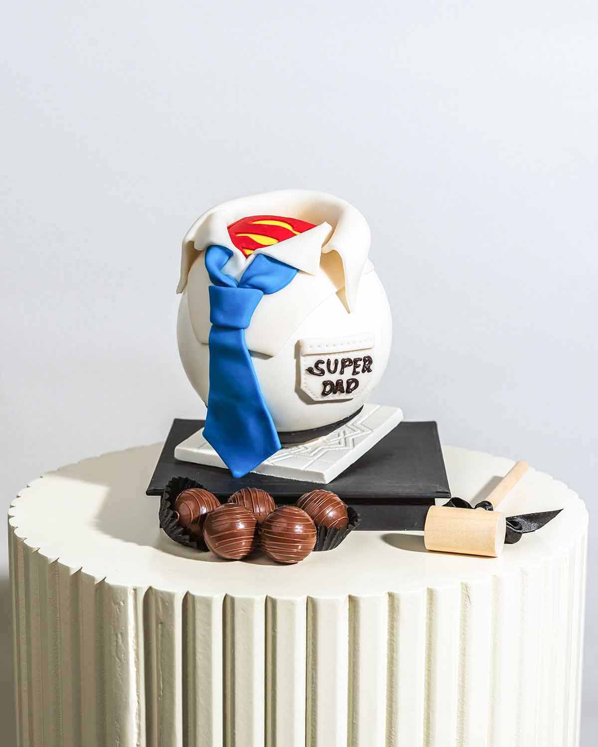 My Super Dad Smashable ChocolateChocolate & ConfectioneryYour Gift Contains:• Fathers Day theme, Super Hero smash ball • 10 Milk Chocolate Assorted Truffles • Flavors: Pistachio, Hazelnut, Speculoos, Peanut Butter and Roche (more flavor choices available)