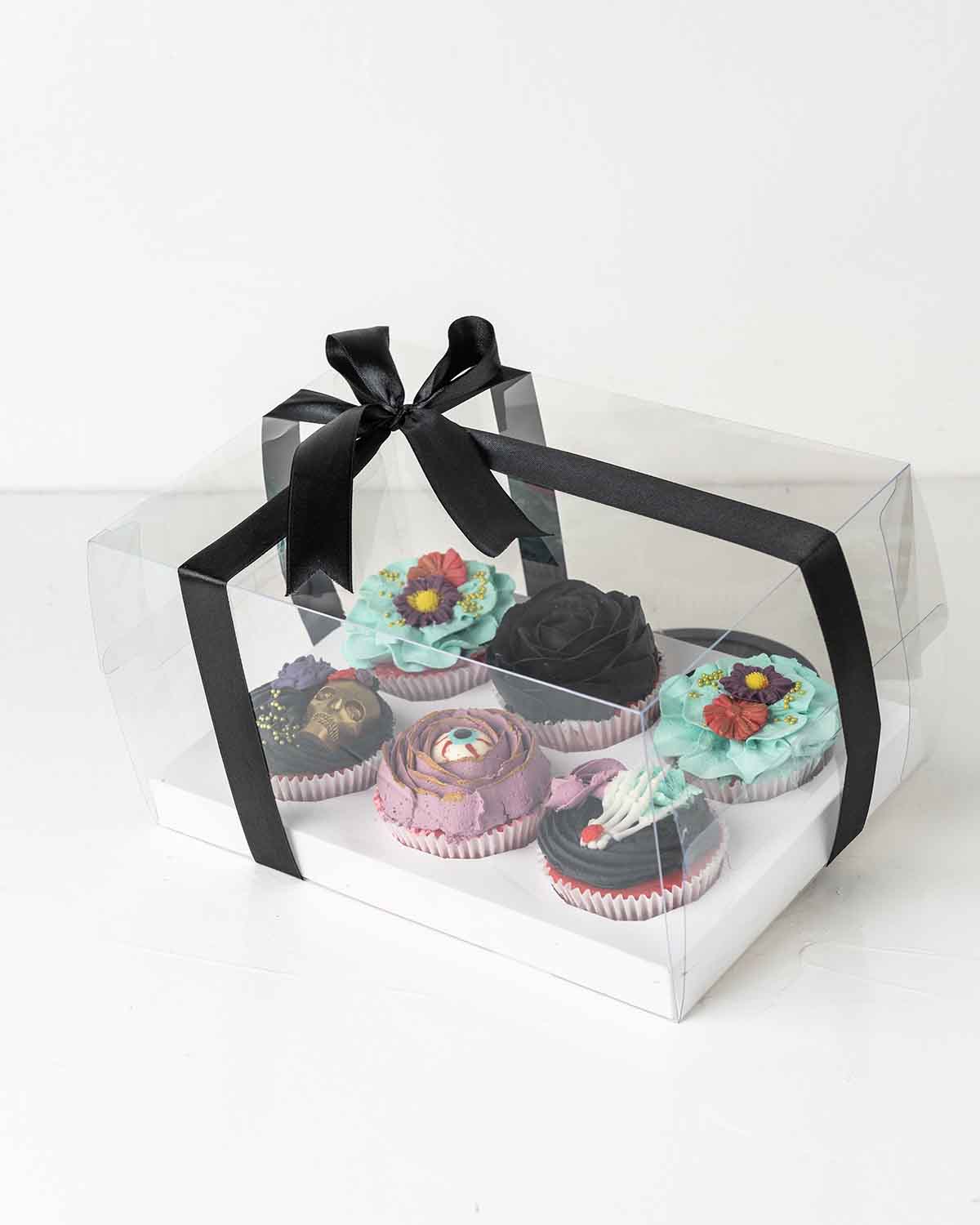 Skull and Eye CupcakesChocolate & ConfectioneryYour Gift Contains:• 6 Halloween Theme Cupcake• Flavor: Chocolate/Vanilla/Red Velvet• Box Size:24 x17x14cmHandling and Storage • Keep away from direct heat and sunlight• Best stored between 12-18 °C• Not suit