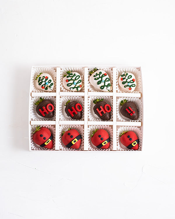 HO HO HO Chocolate Covered StrawberriesChocolate & ConfectioneryYour Gift Contains: • 12 pieces chocolate covered strawberries in holiday theme • Flavor: Milk, White and Colored Chocolate Handling and Storage • Keep away from direct heat and sunlight • Be