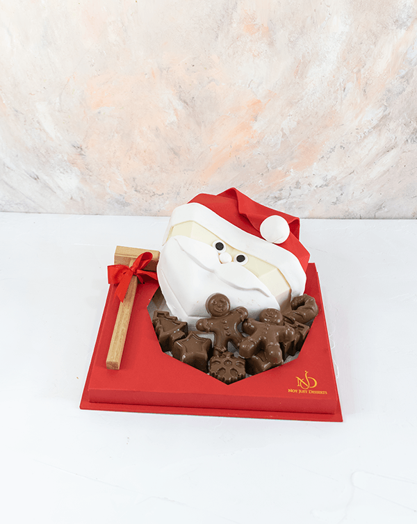 Santa Smashed it by NJDChocolate & ConfectioneryYour Gift Contains: • Approx. 500gms Piñata designed as Santa • Made with colored and white chocolate • Filled with 8 chunky assorted Milk chocolates • Total Weight of the chocolate: 700grams approx. • Hamme