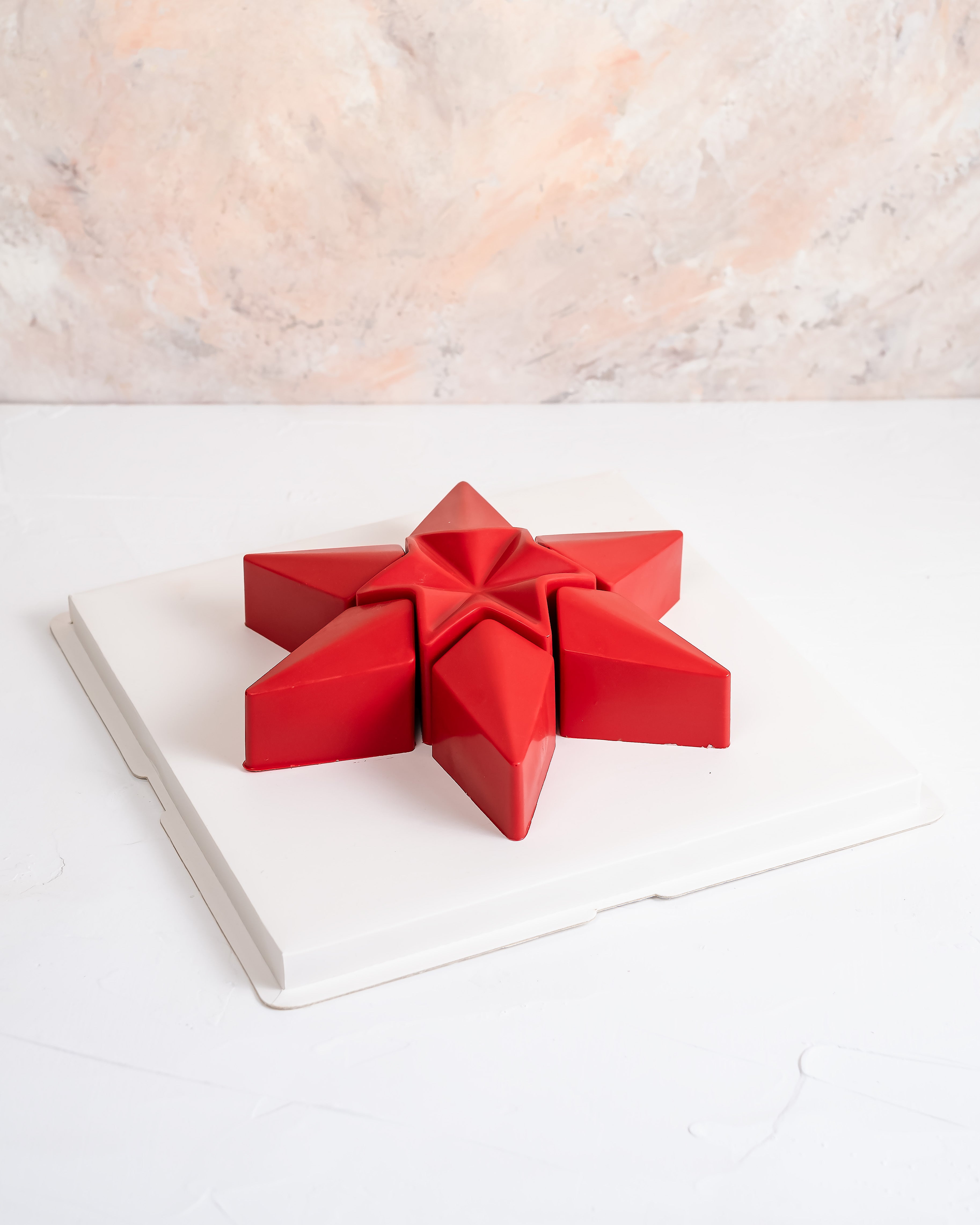 Star Shaped cake by NJDChocolate & ConfectioneryYour Gift Contains: • 900 gram Vanilla sponge cake with Milk Chocolate ganache filling covered with chocolate • Cake Size: 7.5x4.8x5.5cm, Ø9.6cm Handling and Storage • Keep away from direct heat and sunlight