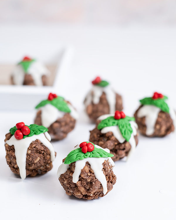 ChocoKrispies by NJDChocolate & ConfectioneryYour Gift Contains: • 12 Belgian chocolate Rice Krispie desserts in Christmas theme • Box Size: 24×18.5×3.5cm Handling and Storage • Keep away from direct heat and sunlight • Best stored between 12-18 °C • Suit