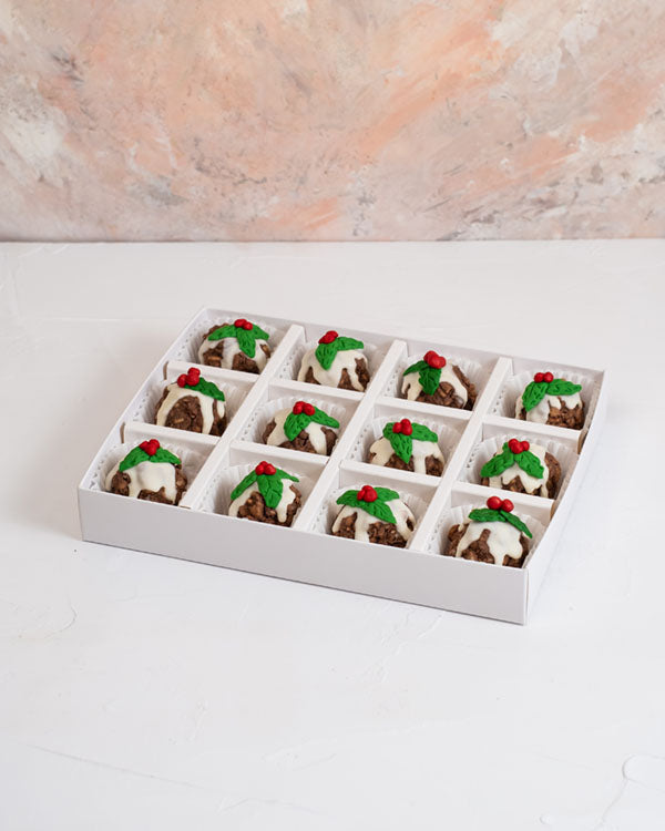 ChocoKrispies by NJDChocolate & ConfectioneryYour Gift Contains: • 12 Belgian chocolate Rice Krispie desserts in Christmas theme • Box Size: 24×18.5×3.5cm Handling and Storage • Keep away from direct heat and sunlight • Best stored between 12-18 °C • Suit