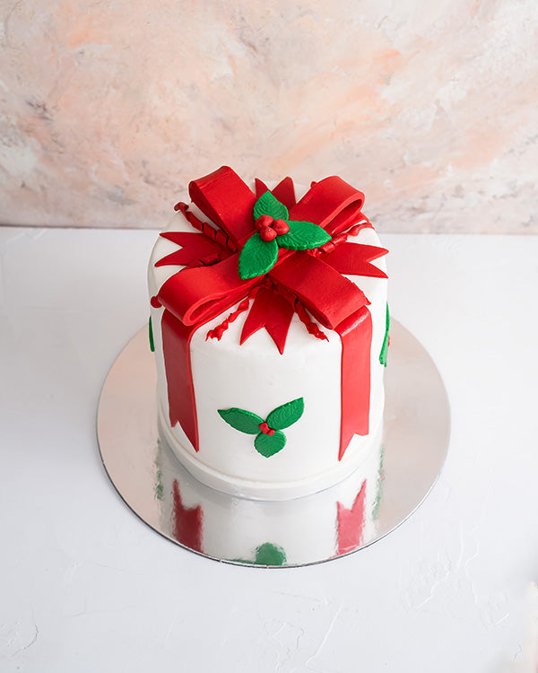 Christmas Cake by NJDChocolate & ConfectioneryYour Gift Contains: • 2kg Vanilla flavor cake with light cream filling Handling and Storage • Keep away from direct heat and sunlight • Best stored between 12-18 °C • NOT Suitable for vegetarians • Not suitabl
