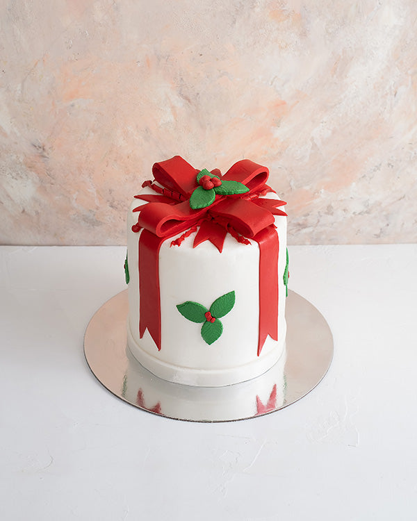 Christmas Cake by NJDChocolate & ConfectioneryYour Gift Contains: • 2kg Vanilla flavor cake with light cream filling Handling and Storage • Keep away from direct heat and sunlight • Best stored between 12-18 °C • NOT Suitable for vegetarians • Not suitabl