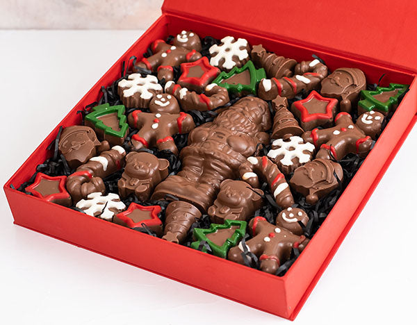 Assorted Xmas Collection by NJDChocolate & ConfectioneryYour Gift Contains: • 29 assorted Christmas theme chocolates • Flavors: Ganache, Praline, Biscoff, Speculoos, Roasted Nuts • Weight of Chocolate: Approx. 700grams • Box Size: 24x24x4cm Handling and S