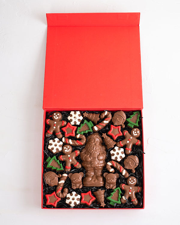 Assorted Xmas Collection by NJDChocolate & ConfectioneryYour Gift Contains: • 29 assorted Christmas theme chocolates • Flavors: Ganache, Praline, Biscoff, Speculoos, Roasted Nuts • Weight of Chocolate: Approx. 700grams • Box Size: 24x24x4cm Handling and S