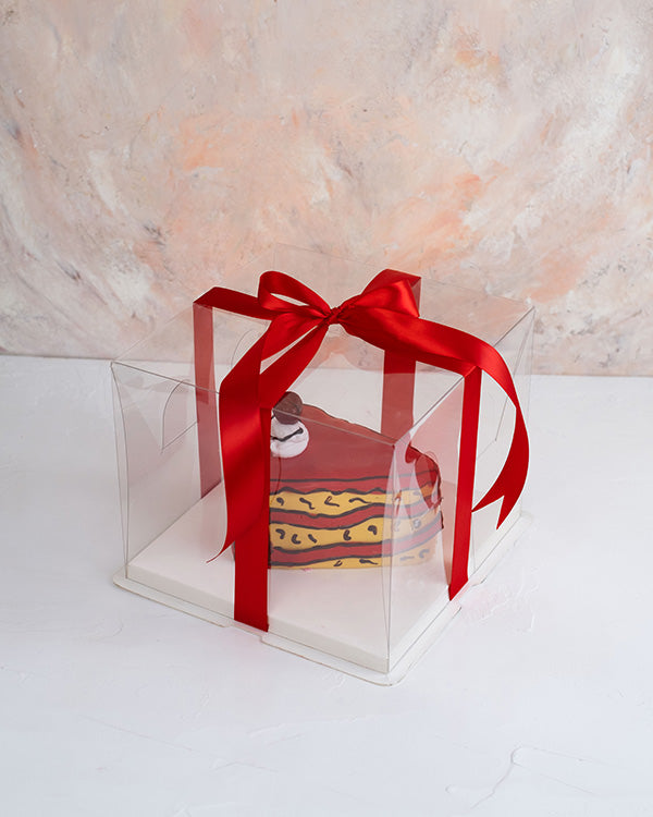 Carton Cake by NJDChocolate & ConfectioneryYour Gift Contains: • 500 grams Vanilla cake with light cream filling designed as Cartoon cake • Weight : 500gram • Color: Red/Green/Pink Handling and Storage • Keep away from direct heat and sunlight • Best stor