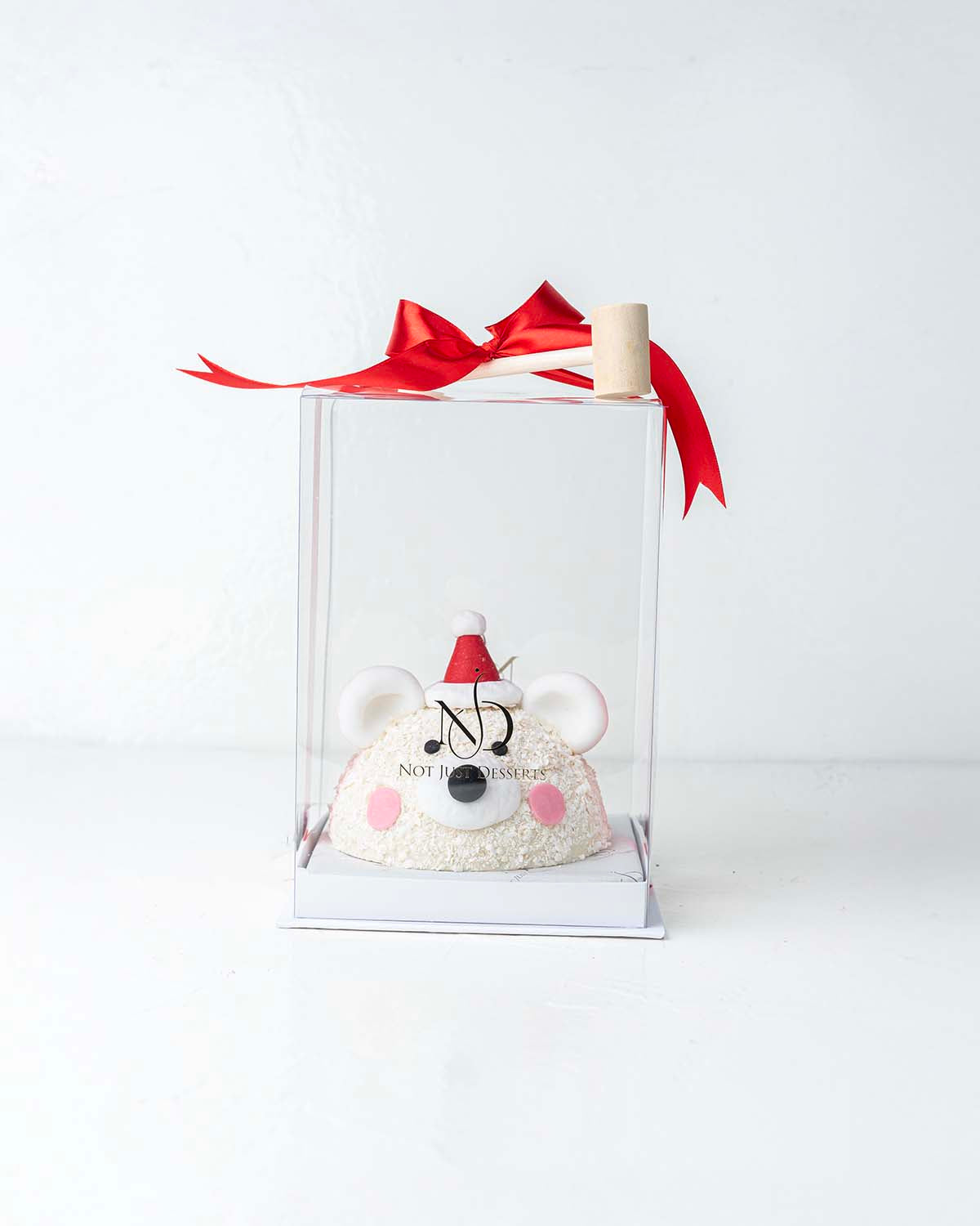 Polar Bear Smash ChocolateChocolate & ConfectioneryYour Gift Contains:• 500grams Pinata Polar Bear• 10 assorted milk chocolate truffles• Flavors: Pistachio, Hazelnut, Speculoos, Peanut Butter and Roche• Wooden Hammer x 1• Box Size: 23x23x26 cmHandling and