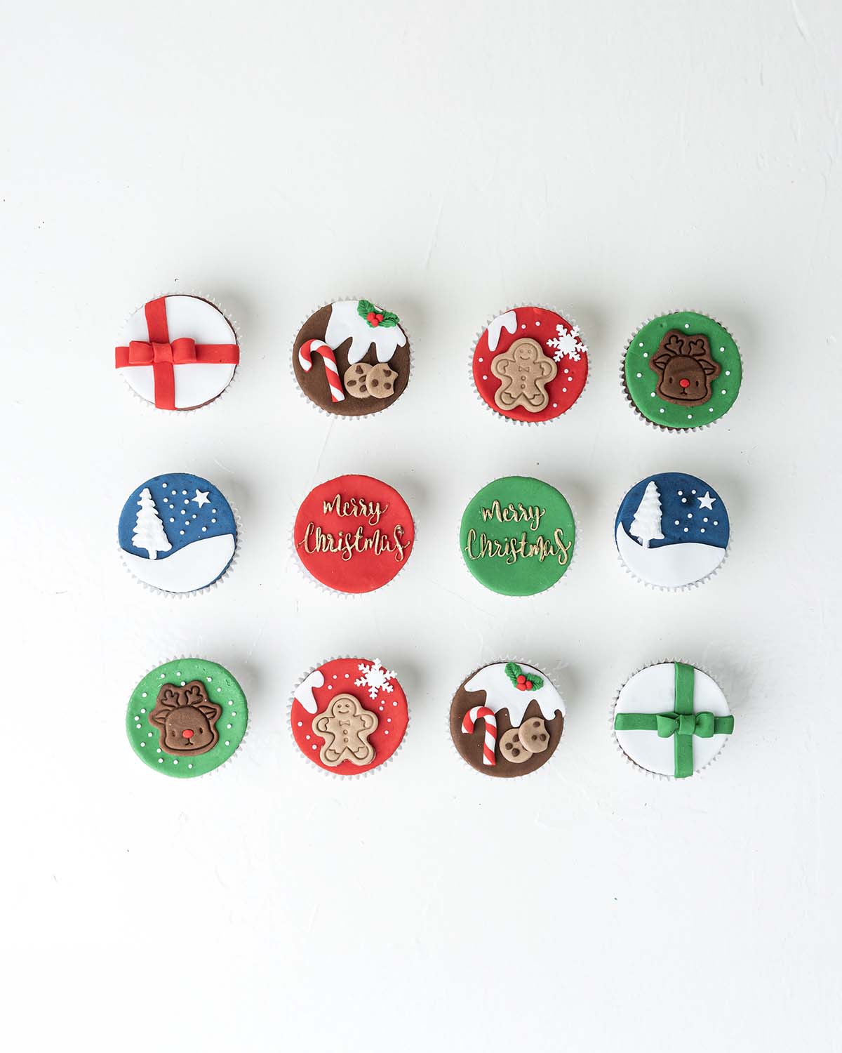 12 Christmas CupcakesChocolate & ConfectioneryYour Gift Contains:• 12 Merry Christmas Theme cupcakes• Flavor: Chocolate/Vanilla/Red Velvet• Box Size: 34 x26x14cmHandling and Storage• Keep away from direct heat and sunlight• Best stored between 12-18 °C• N