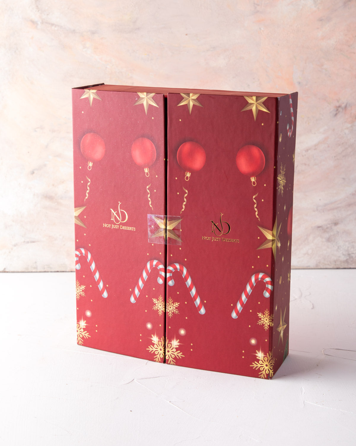 Chocolate Advent Calendar by NJDChocolate & ConfectioneryYour Gift Contains: 12 days chocolate Advent calendar by NJD 1. 1 box Milk chocolate covered Oreos 2. 1 box Dark chocolate covered Oreos 3. 1 box Milk chocolate Truffles 4. 1 box Dark chocolate Truf