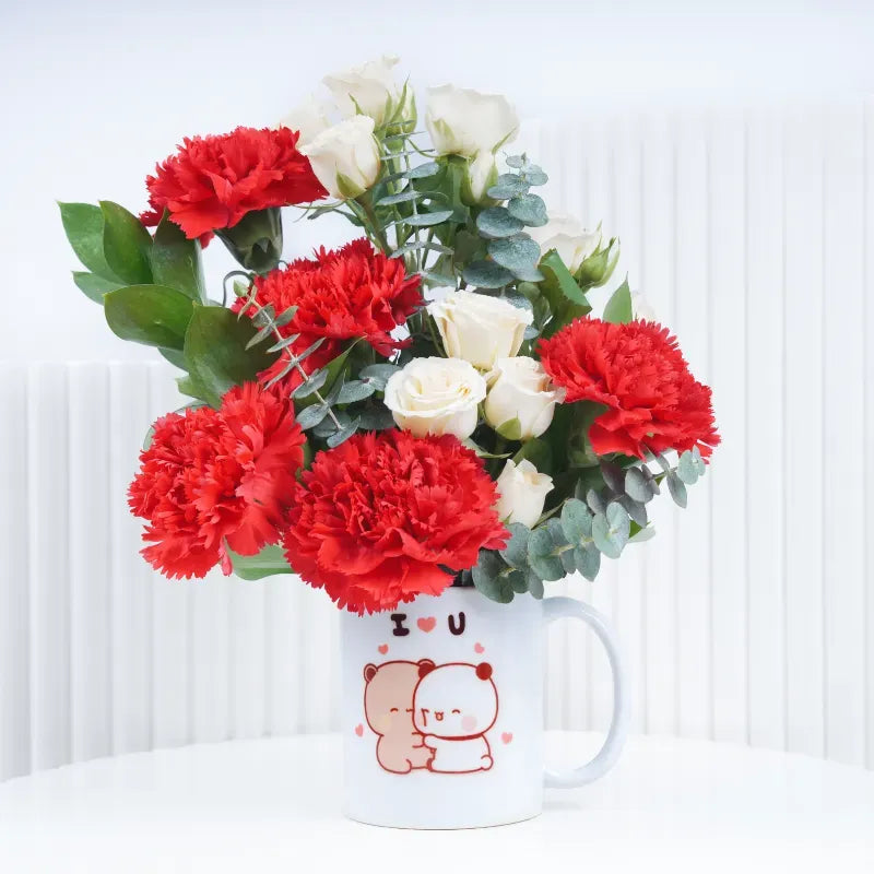 Thought 7 carnation and roses arranged in mug