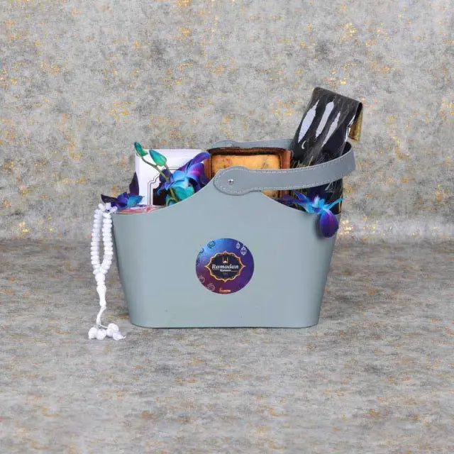 Bag of Wishes Ramadan HamperGifts and HampersHamper Includes: Swiss Rabia Oud Oil 1 Prayer Beads Assorted Color Madjool Dates in Assorted Ramadan Kareem Pouch 100gm Dates Mamoul 5 Pcs Blueberry Loaf Cake Dried Cranberries in a Jar 200gm 1 Karak Tea Cup Ar