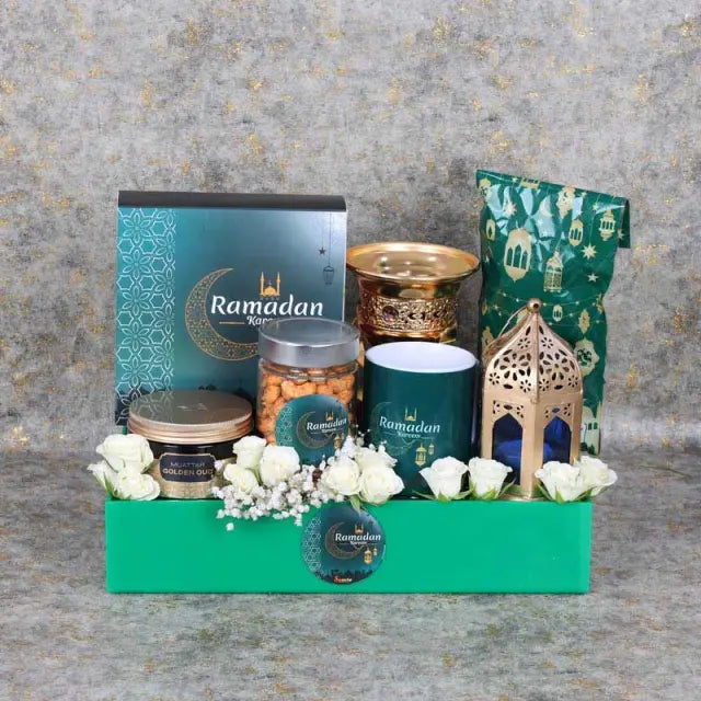 Blissful Ramadan Hamper GreenGifts and HampersHamper Includes: Assorted Stuffed Dates Box 16 Pcs By Sweecho 1 Swiss Arabia Bakhoor 1 Bakhoor Burner Assorted Sweecho Chocolates in Ramadan Kareem Pouch 100gm Arabic Coffee 100gm 1 Ramadan Kareem Coffee Mug C