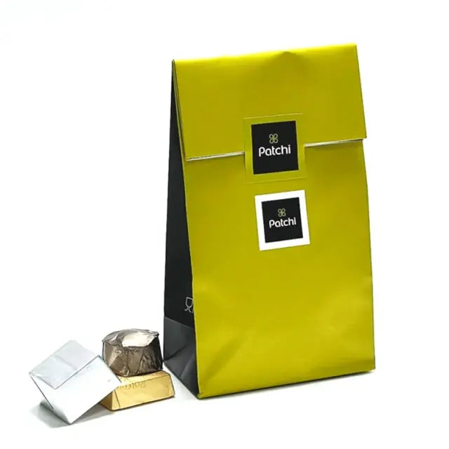 Dark Beauty 5 Purple Tulips and Deluxe Patchi ChocolatesChocolate & Confectionery100gm Deluxe Patchi Chocolates 5 Purple Tulips Beautifully Wrapped and a Ribbon Bow