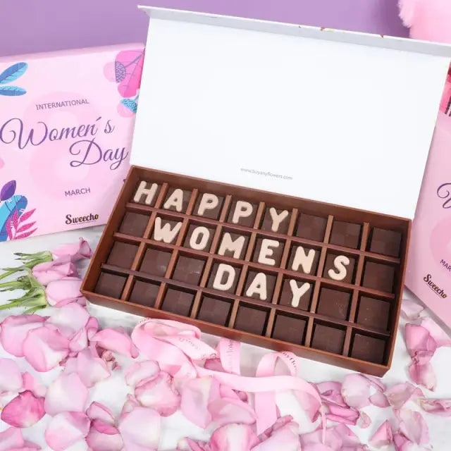 Happy Womens Day Chocolates By SweechoChocolate & ConfectioneryBrand - Sweecho Text - Happy Womens Day Type - Milk Chocolate Quantity - 25 Pcs Marble Chocolate Letters Assorted Flavors - Pistachio, Cheesecake, Peanut, Caramel and Wafers Allergens - Nuts a