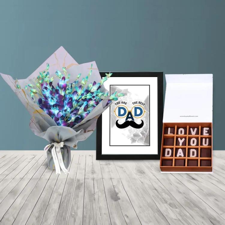 Orchid Bouquet Frame and Chocolate TrioChocolate & ConfectioneryLove You Dad Chocolates By Sweecho, Best Dad Frame A4 Size, 15 Blue Orchid, Beautifully Wrapped in Grey Marble Wrapping, Tied With White Ribbon Bow.