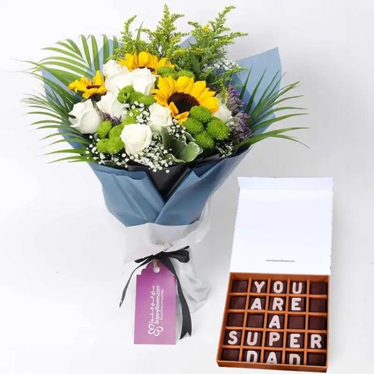 Charisma Flowers and Super Dad ChocolateChocolate & ConfectioneryYou Are A Super Dad Chocolates By Sweecho, 3 Sunflowers, 10 White Roses, 4 Stems Green Button Chrysanthemums, 3 Stem Soliduster, Leaves : 3 Kentia Palm and 2 Stem Pittosporum, Fillers : 2 St