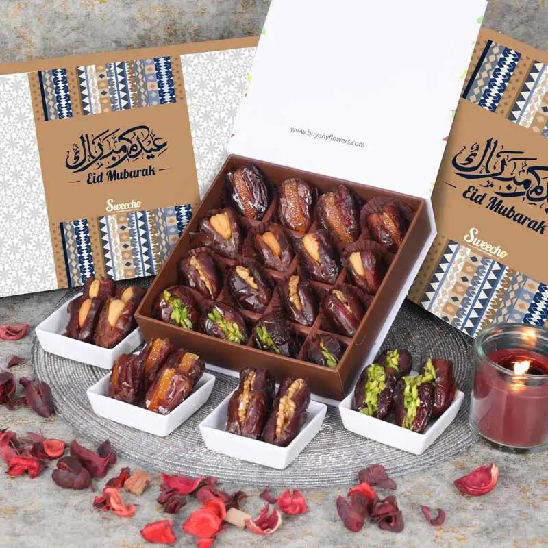 Eid Stuffed Dates By Sweecho 16 Pcs BlueChocolate & ConfectioneryProduct Description Assorted Stuffed Dates Flavors - Pistachio, Orange Peel, Cashew and Walnut Quantity - 16 Pcs Arranged in a Beautiful Eid Gift Box
