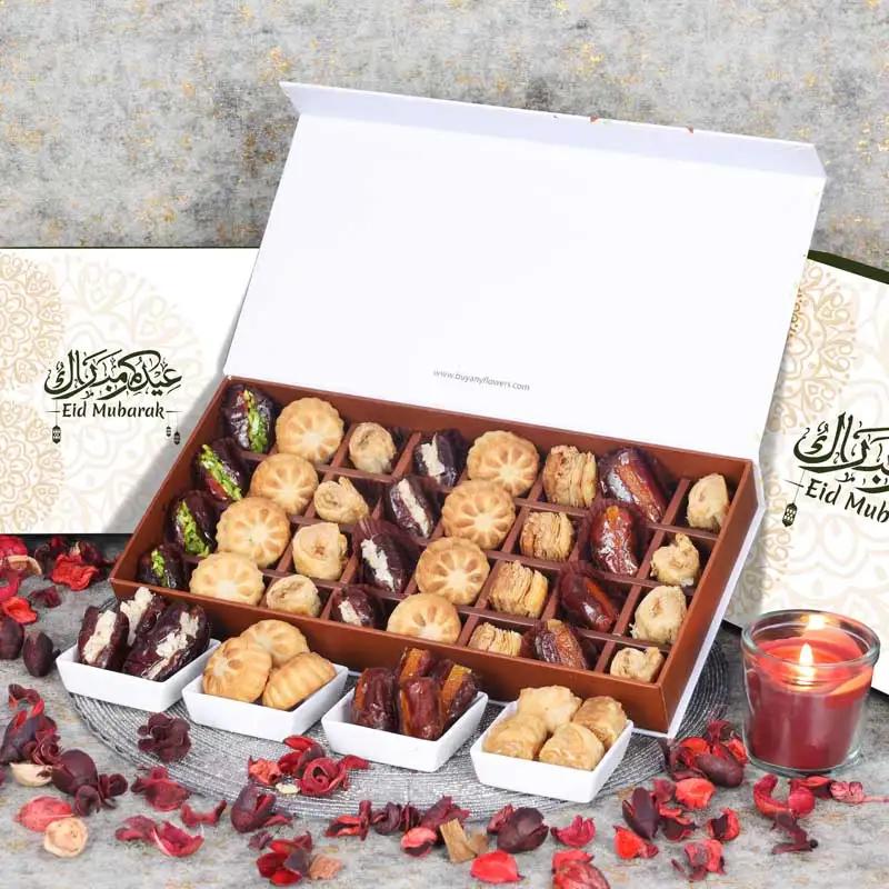 Eid Stuffed Dates Mamoul And Baklawa By Sweecho 32 Pcs GreenChocolate & ConfectioneryProduct Description Assorted Stuffed Dates, Mamoul and Baklawa Flavors - Pistachio, Almond and Orange Peel Quantity - 32 Pcs Arranged in a Beautiful Eid Gift Box