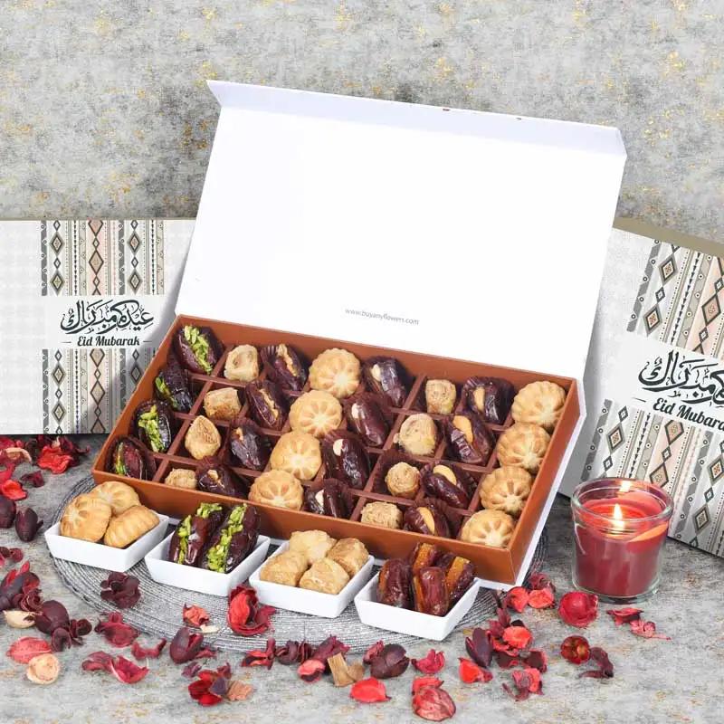 Eid Stuffed Dates Mamoul And Baklawa By Sweecho 32 Pcs PeachChocolate & ConfectioneryProduct Description Assorted Stuffed Dates, Mamoul and Baklawa Flavors - Pistachio, Hazelnut, Cashew and Walnut Quantity - 32 Pcs Arranged in a Beautiful Eid Gift Box