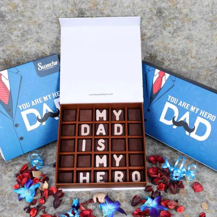 My Dad is My Hero Chocolates By SweechoChocolate & ConfectioneryBrand - Sweecho, Text - My Dad Is My Hero, Type - Milk Chocolate, Quantity - 25 Pcs, Marble Chocolate Letters, Assorted Flavors - Pistachio, Cheesecake, Lotus, Hazelnut, Coffee, Cornflakes an