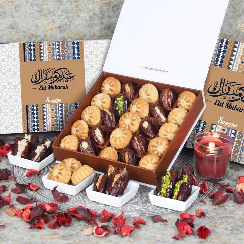 Eid Stuffed Dates And Mamoul By Sweecho 25 Pcs BlueChocolate & ConfectioneryProduct Description Assorted Stuffed Dates and Dates Mamoul Flavors - Pistachio, Orange Peel, Cashew, Walnut and Hazelnut Quantity - 25 Pcs Arranged in a Beautiful Eid Gift Box